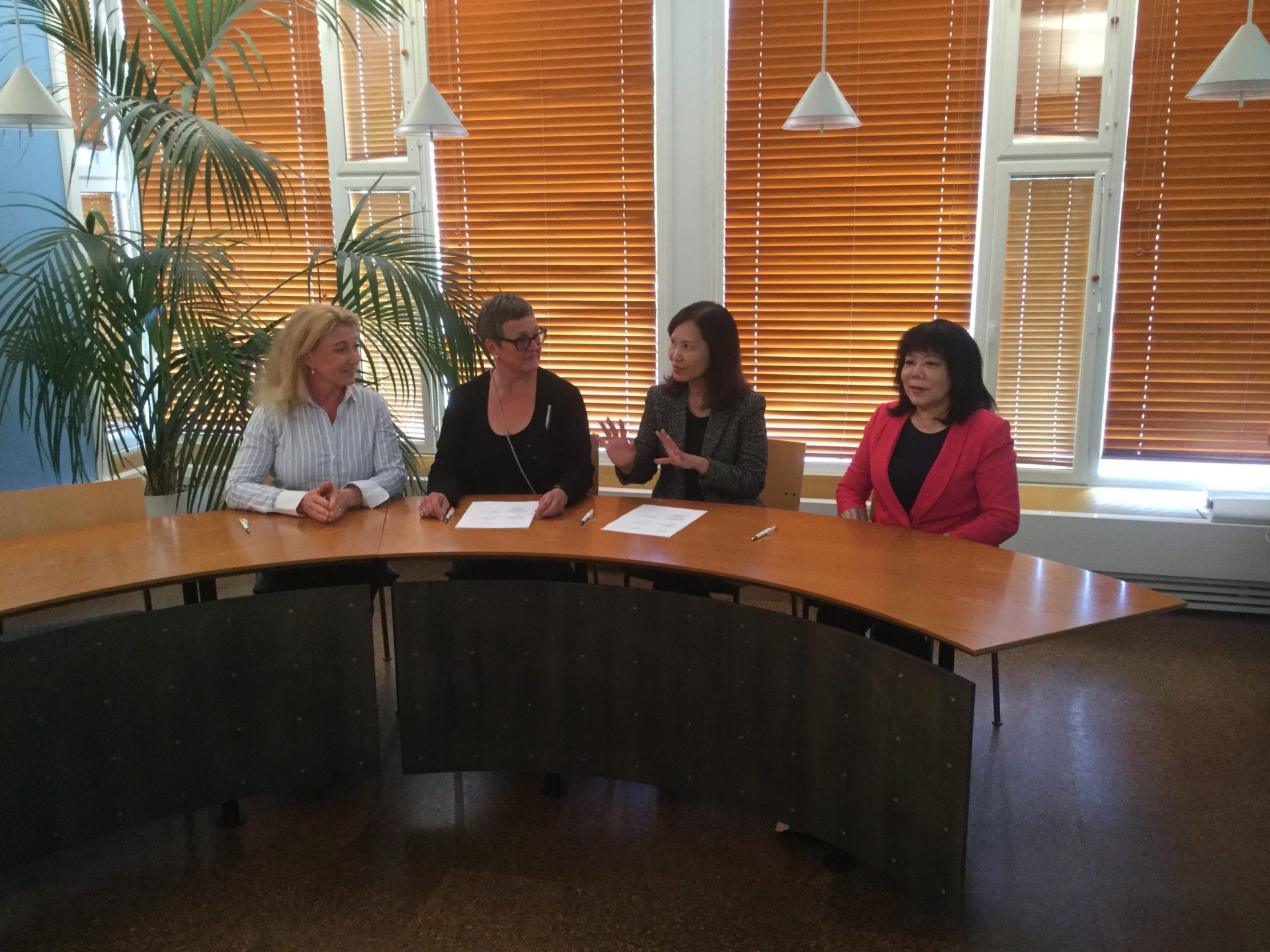 Four women sitting at the table